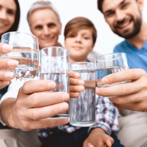 close-up-cheerful-family-cheering-with-glasses-water.jpg close-up-cheerful-family-cheering-with-glasses-water.jpg